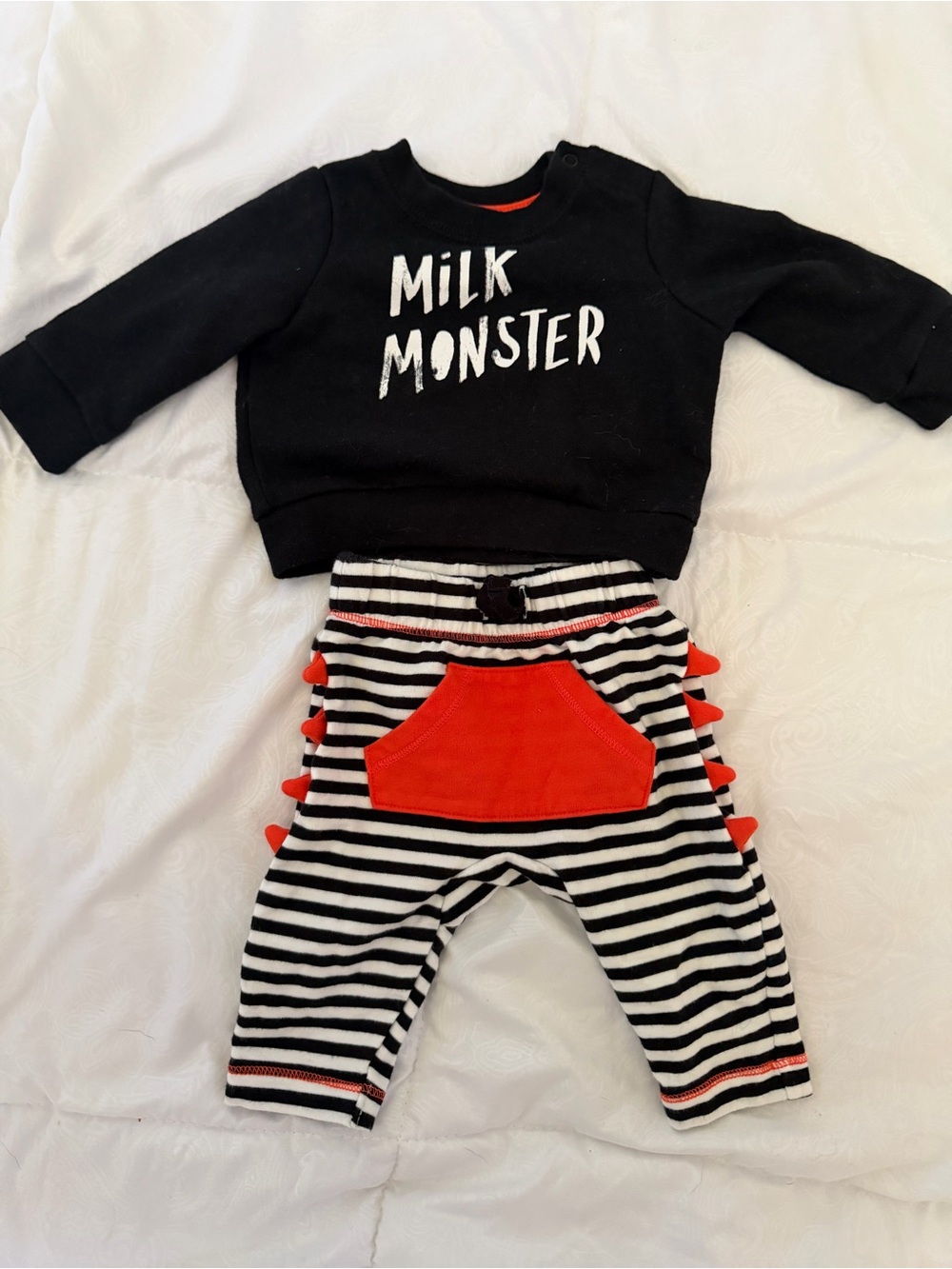 Baby Black "Milk Monster" Top and Black-White Striped Bottoms with Red Accents
